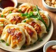 RAVIOLI PORC SAUCE CURRY JAUNE 11,50€ *ail, curry jaune, lait de coco